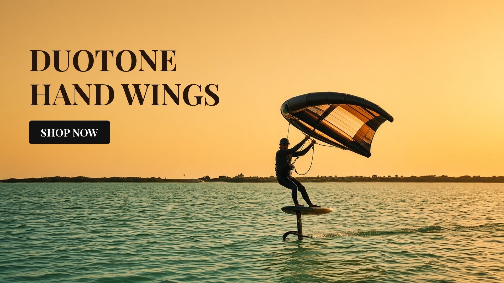 Duotone Hand Wings - wing foiler at sunset